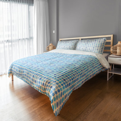 Couvre-oreiller à pois bleus