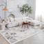 Tapis d'intérieur à motif géométrique gris crème.-1014529662
