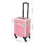 Valise de maquillage à roulettes rose, organisateur de beauté avec clés, idéale pour les maquilleurs et prothésistes ongulaires.