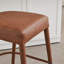 Tabouret de bar en faux cuir brun à hauteur de comptoir - siège rembourré confortable avec pieds et repose-pieds robustes en métal, sièges élégants pour îlot de cuisine, comptoir de pub et de salle à manger, 2 ensembles