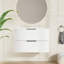 Meuble-lavabo mural blanc de 76 cm (30 pouces), deux grands tiroirs intérieurs, forme en U pour une évacuation facile, fermeture lisse, style flottant, grande capacité de rangement, lavabo en céramique brillante.