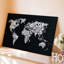 Toile, une carte du monde minimaliste composée entièrement de noms de pays en art mural, typographie blanche sur fond noir uni-531416598