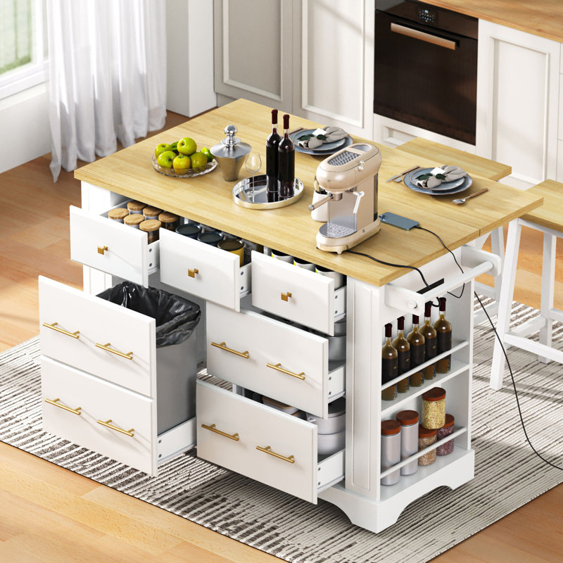 Versatile White Kitchen Island With 6 Drawers, Pull-Out Trash Can, And Drop Leaf, Featuring Power Outlet And 5 Open Racks For Enhanced Functionality