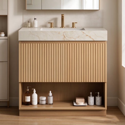 Meuble-lavabo autoportant de 76 cm (30 pouces) avec dessus en pierre frittée veinée gris Carrara, lavabo en céramique et trois trous prépercés pour robinetterie.