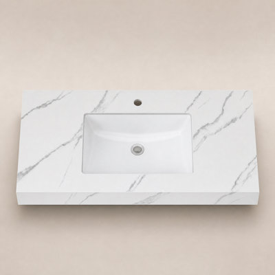 Plan de toilette en pierre frittée de 91 cm (35,8 po) de largeur avec lavabo encastré en céramique, comptoir aspect marbre blanc avec trou pré-percé pour robinetterie.