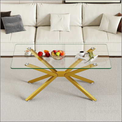 Table basse rectangulaire en verre trempé avec pieds en métal doré