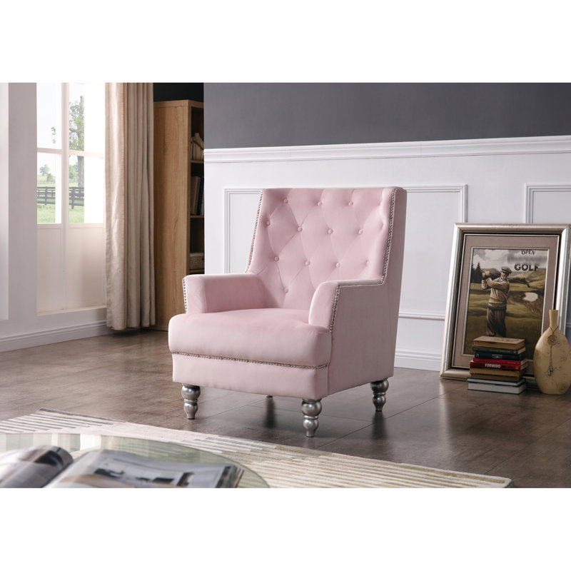 Charmant fauteuil traditionnel à accoudoirs ronds
