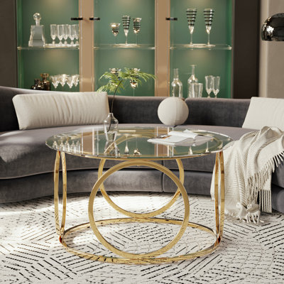 Table basse ronde avec plateau circulaire en verre