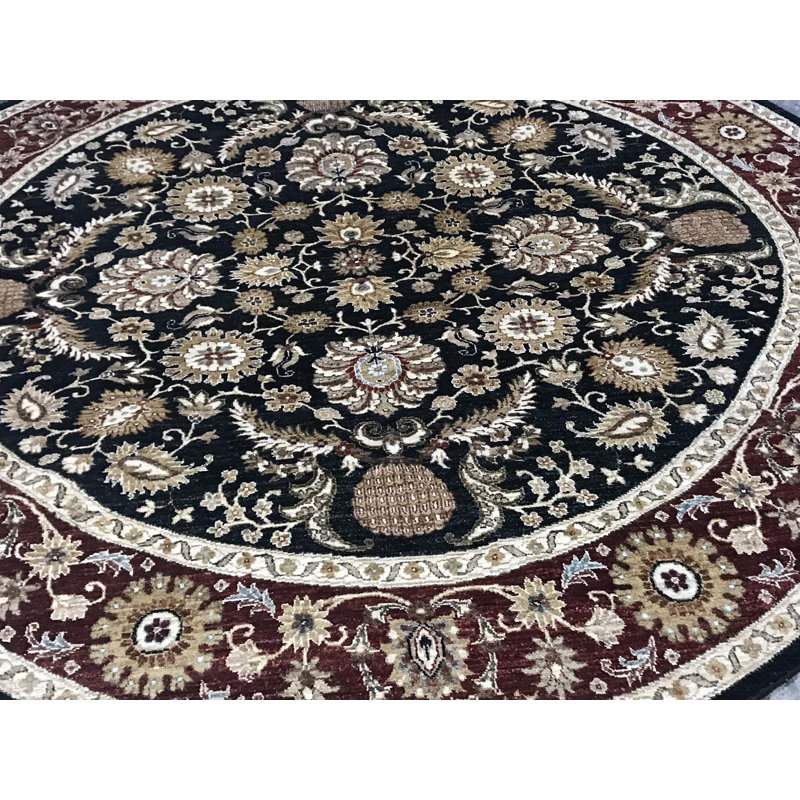 Tapis noir, rouge et ivoire de haute qualité noué à la main