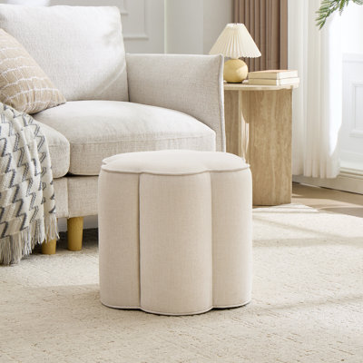 Thirza Petal-Shaped Upholstered Ottoman with Padded Top