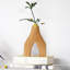 Vase décoratif en bois arqué