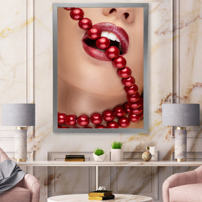 " Woman Mouth With Red Lipstick Biting Red Pearls "