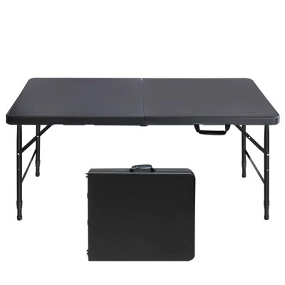 Table pliable 4 pi pour camping, noir. Convient à une utilisation intérieure et extérieure. Capacité de 135 kg. Fixation facile à plier et à transporter. Surface de camping lisse et imperméable noire. Polyvalent dans les environnements. Max