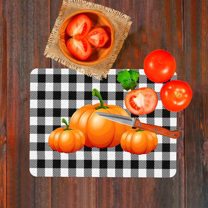 Planche à découper Spooky sur le thème d'Halloween avec une conception de citrouille frappante, parfaite pour la décoration automnale et les réceptions
