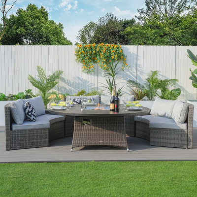 Chellis 6 - Person Patio Dining Set with Round Table , Cushions Included