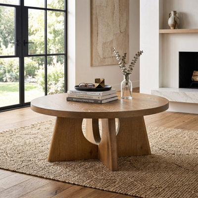 Table basse à piédestal Blitar avec découpe et forme en croix
