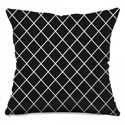 Coussins décoratifs noirs et blancs à motif de losanges