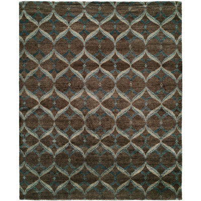 Heaney Geometric Area Rug in Brown