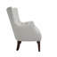 Fauteuil à oreilles capitonné