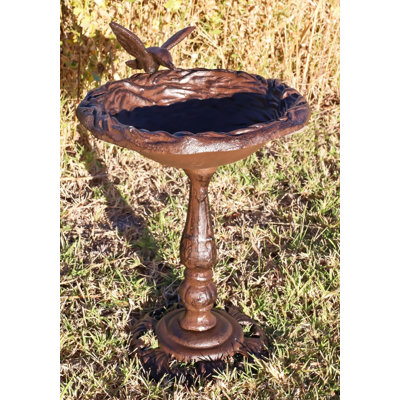 Statue de jardin Tucana colibri planant au-dessus d'un nid