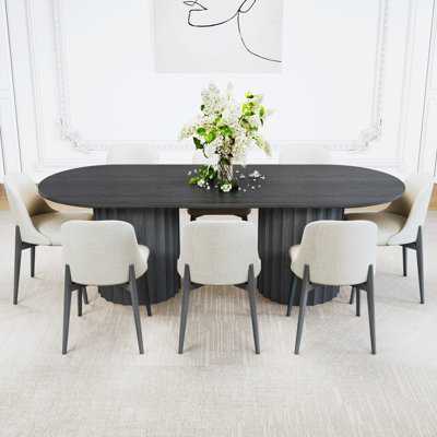 Wexler 9 - Piece Oval Solid Wood Dining Set