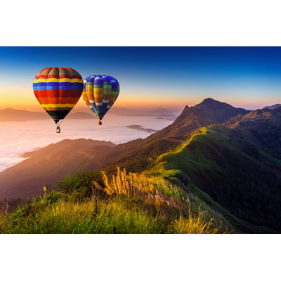 Hot Air Balloons At Sunrise by Tawatchaiprakobkit - Wrapped Canvas Print