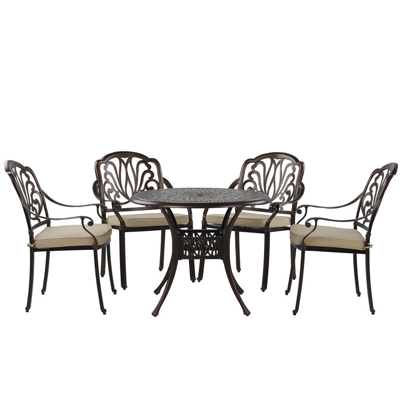 Aadhiran 4 - Person Patio Dining Set with Round Table , Cushions Included
