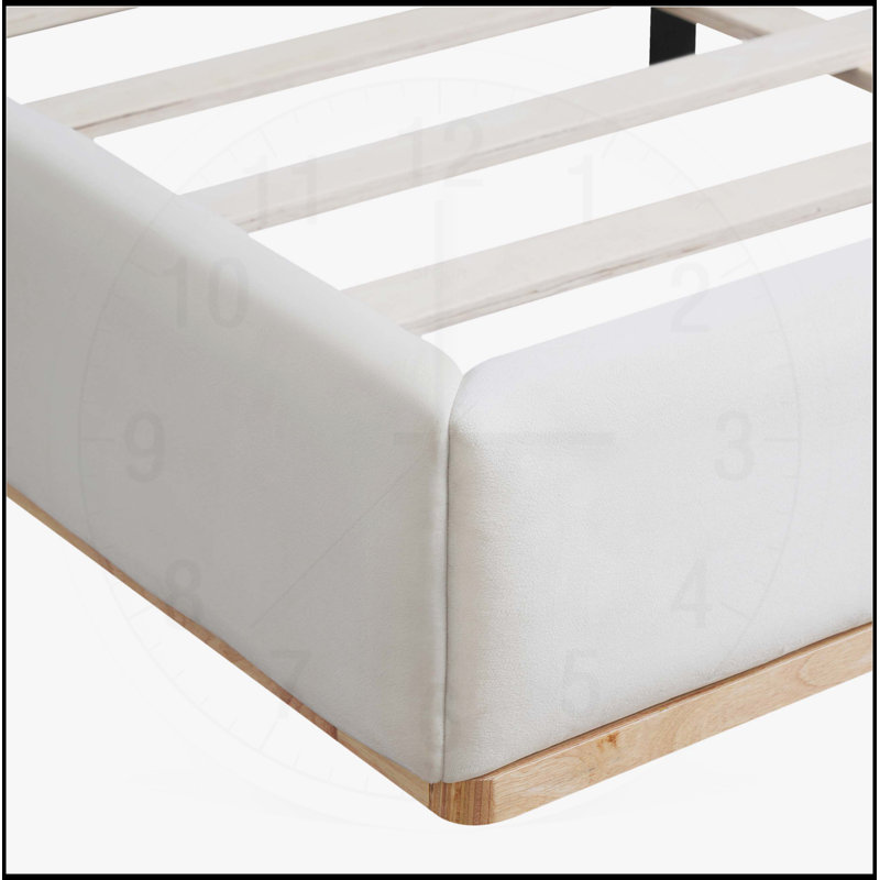 Élégant très grand lit tapissier avec structure en bois massif, offrant confort et durabilité pour une expérience de sommeil luxueuse, blanc
