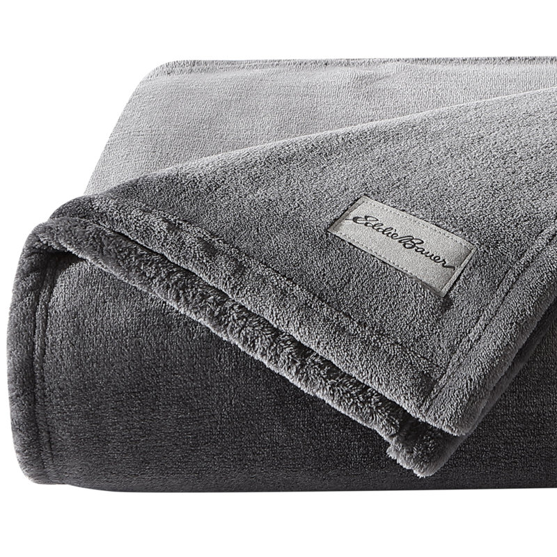 Cozy Twin-Sized Fleece Packable Blanket in Ivory