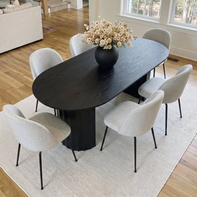 Ensemble de table de salle à manger 79 "ovale noire 79" avec 6 chaises de salle à manger rembourrées blanches, base double piédestal