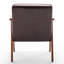 Chaise de chambre à coucher de style Mid-Century avec des coussins en bois massif confortables et stables pour une expérience relaxante