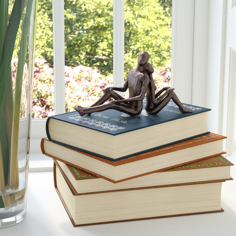 Sculpture Akyng, couple romantique assis en bronze