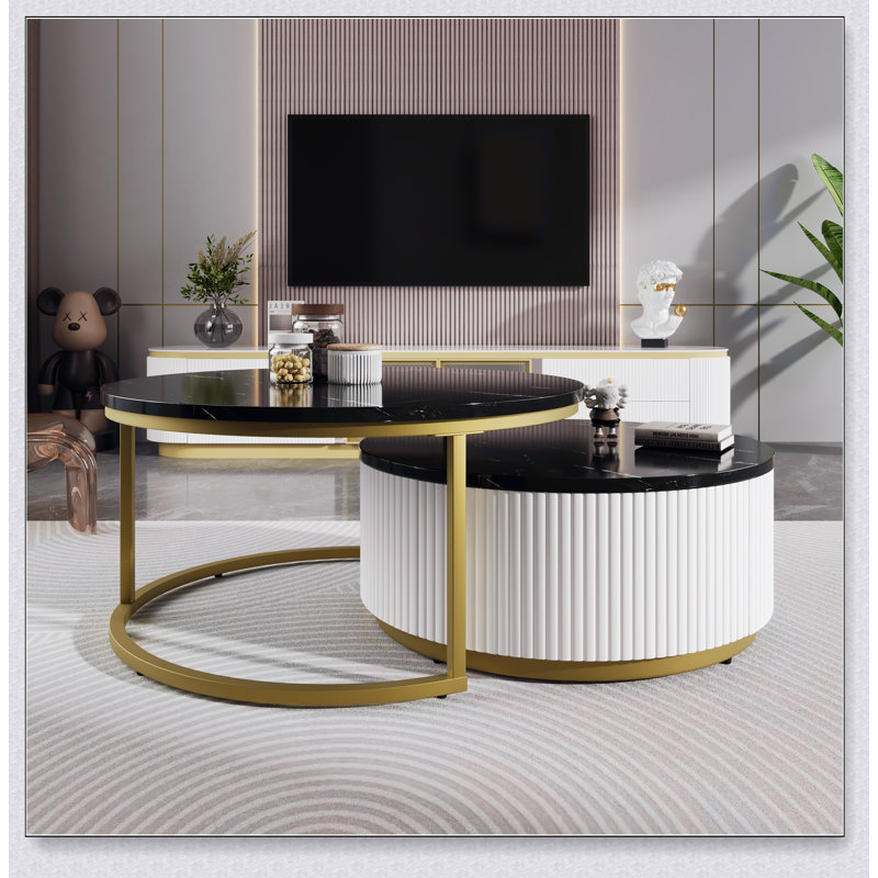 Table basse gigogne ronde moderne avec motif cannelé et tiroir noir et or, parfaite pour un rangement élégant