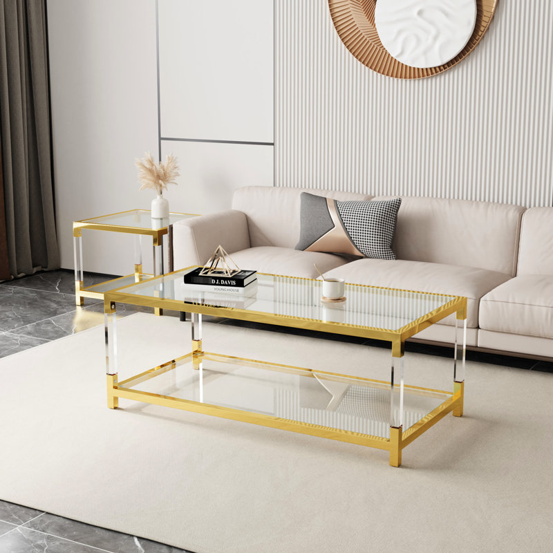 Table élégante avec des éléments en métal et en acrylique, au design minimaliste et moderne, idéale pour le bureau.