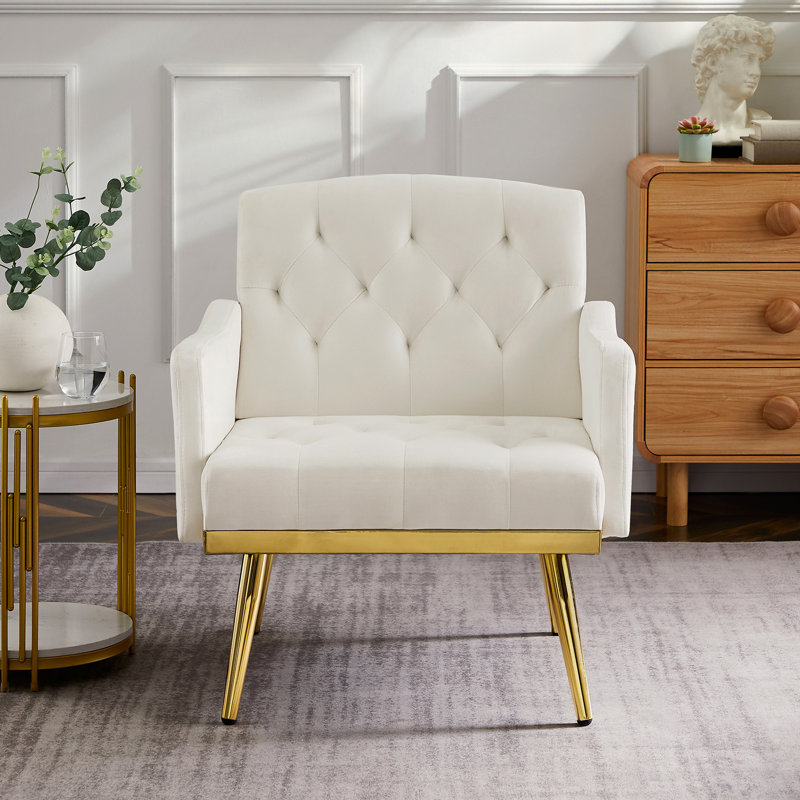 Fauteuil en velours avec pieds en métal