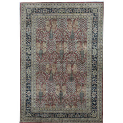 Tapis rouge et ivoire noué à la main de haute qualité