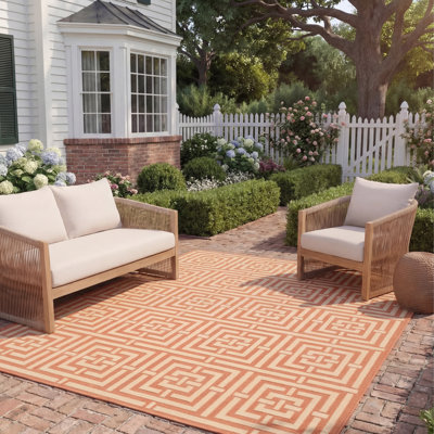 Tapis d'intérieur / extérieur à motif géométrique terre cuite / crème Arneshia