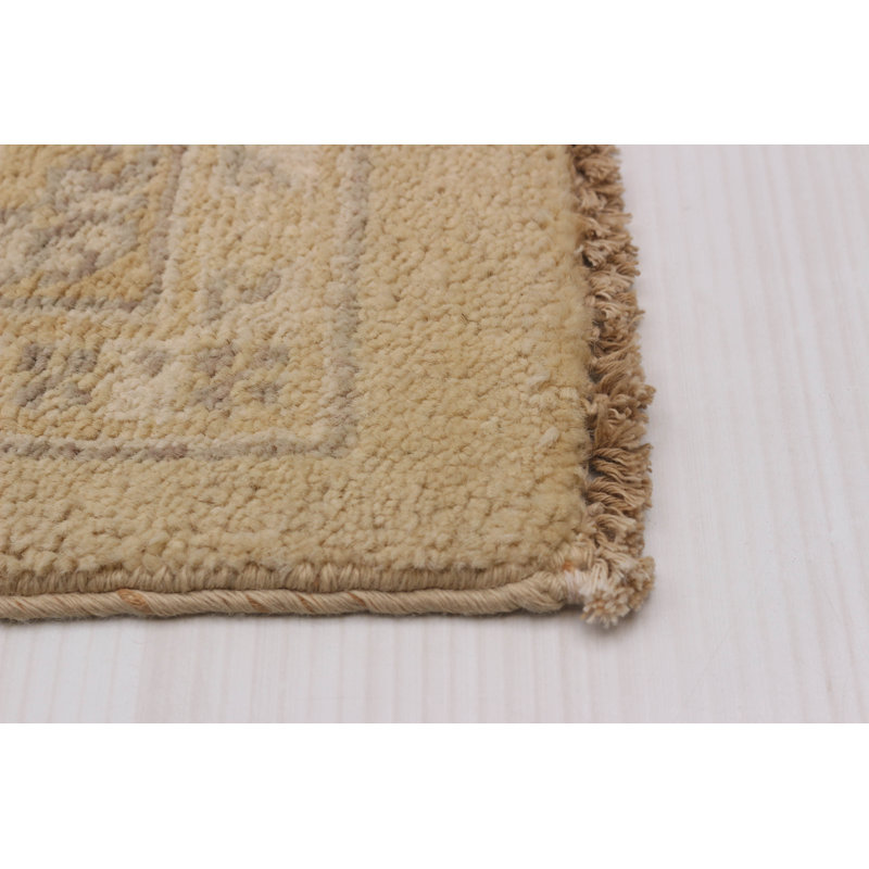 Tapis ivoire en laine New Age Adriahna