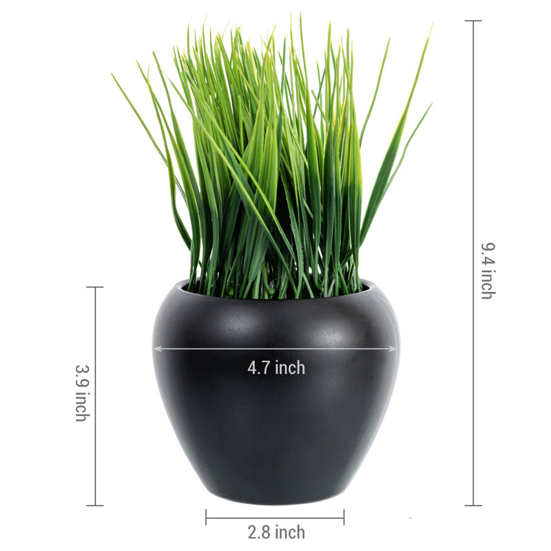 Faux plantes artificielles avec pots noirs