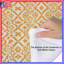 Édredon orange à motif ikat-130505316