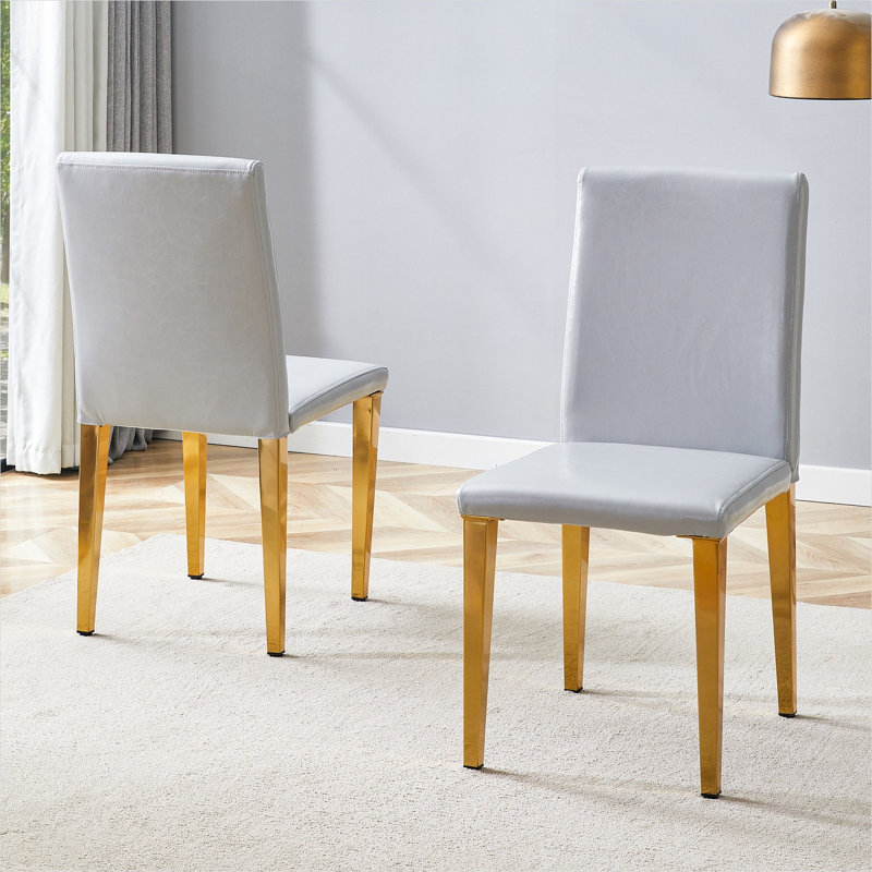 Élégantes chaises de salle à manger en cuir PU gris clair avec pieds en métal doré - ensemble de 2