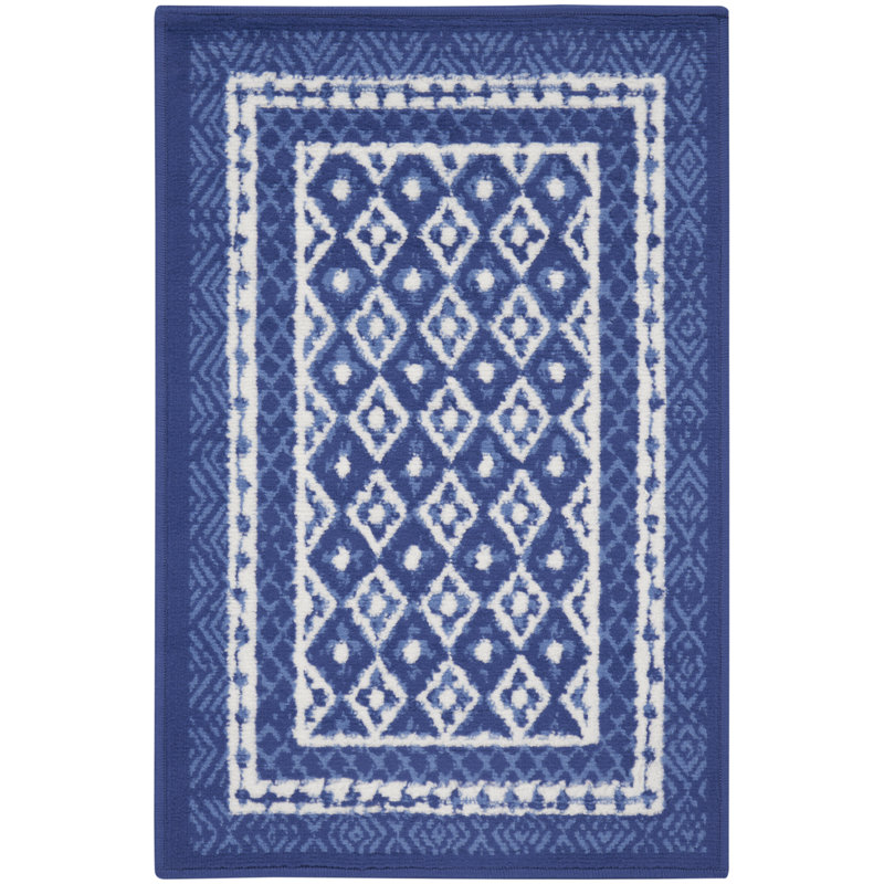 Tapis bleu marine en polypropylène tissé à la machine Cauy, Rectangle 2 pi x 3 pi