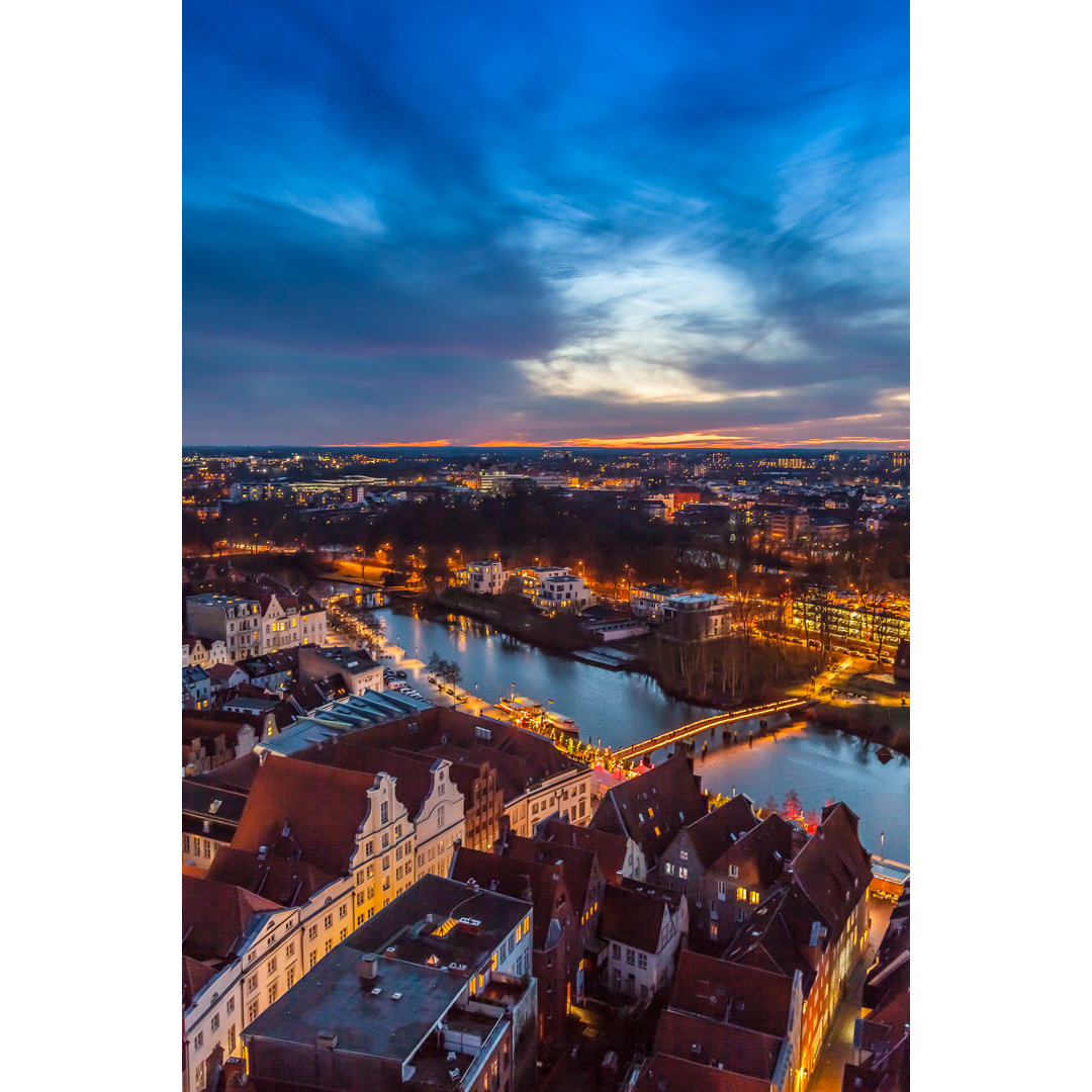 Lübeck Deutschland bei Nacht by OKOFOTO - Druck