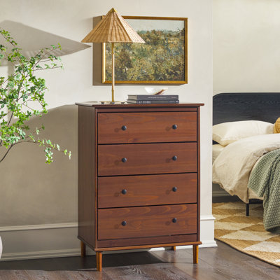 Bhuneshwar Solid Wood 4-Drawer Dresser by Wade Logan
