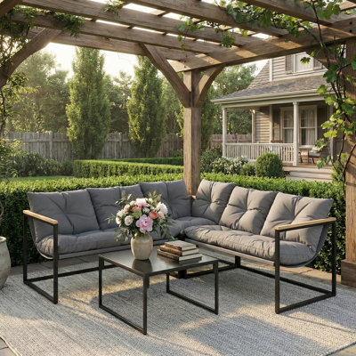 Ensemble de meubles de patio 4 pièces avec table basse et coussins, gris