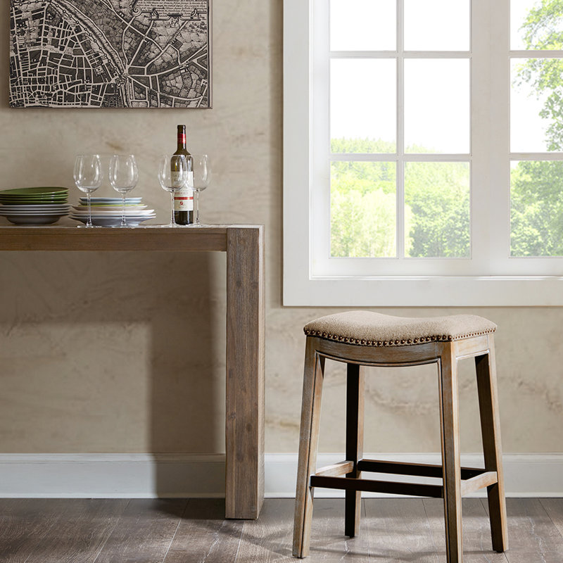 Sophisticated Saddle Counter Stool With Foam Inner And Copper Trimming Feature Captivating High Density Lining