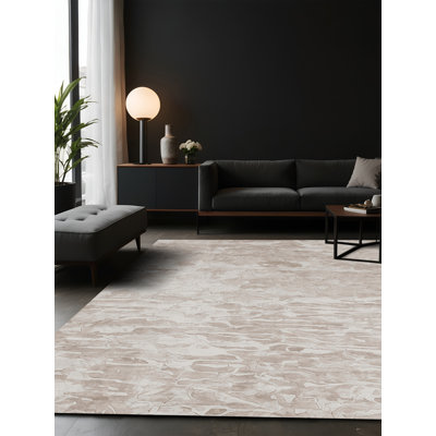 Tapis gris soyeux et moelleux
