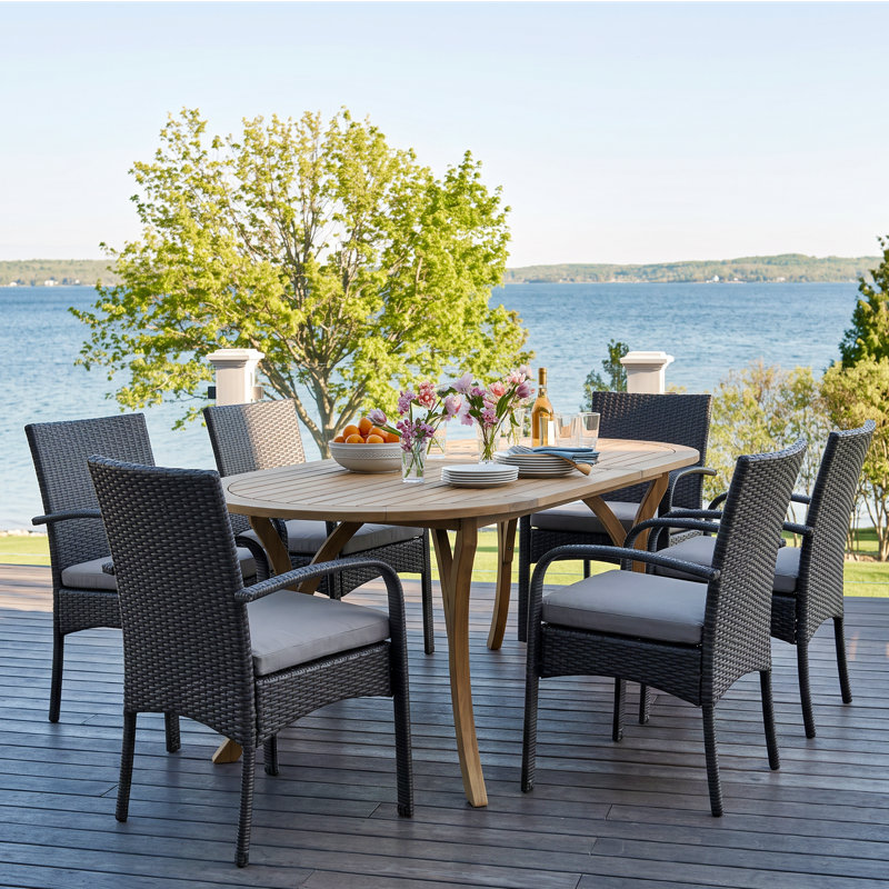 Lecuyer 6 - Person Acacia Wicker Patio Dining Set with Oval Table , Cushions Included