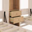 Deux lits simples dans un lit escamotable avec garde-robe, rangement et deux tiroirs, beige et bois