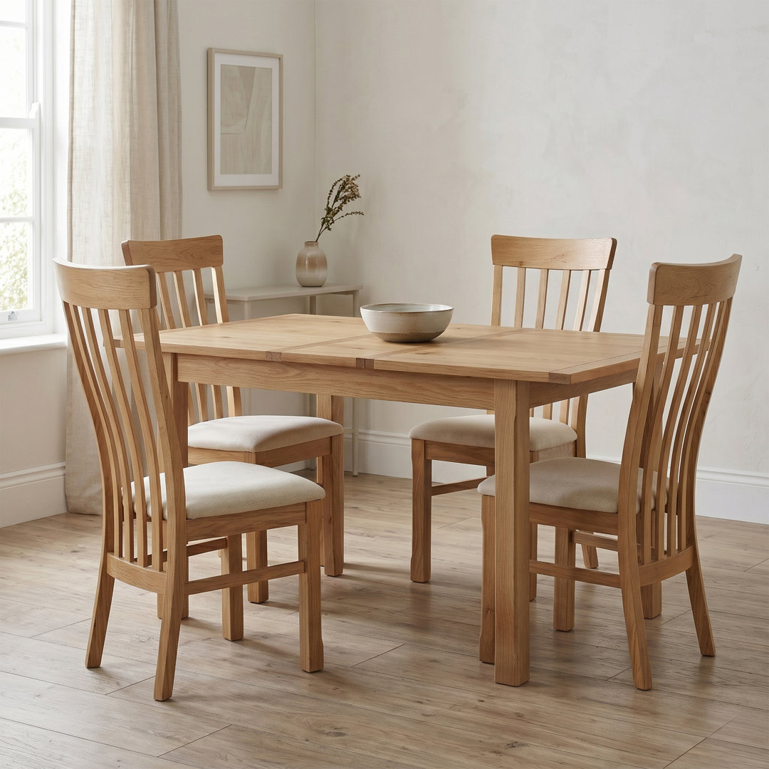 Racquel Butterfly Leaf Solid Oak Dining Set